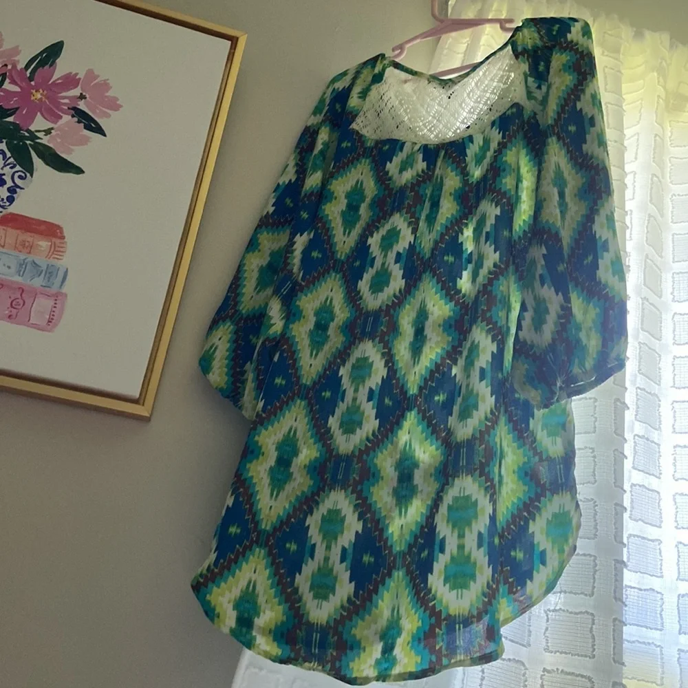 Girls blouse with a super cute design..